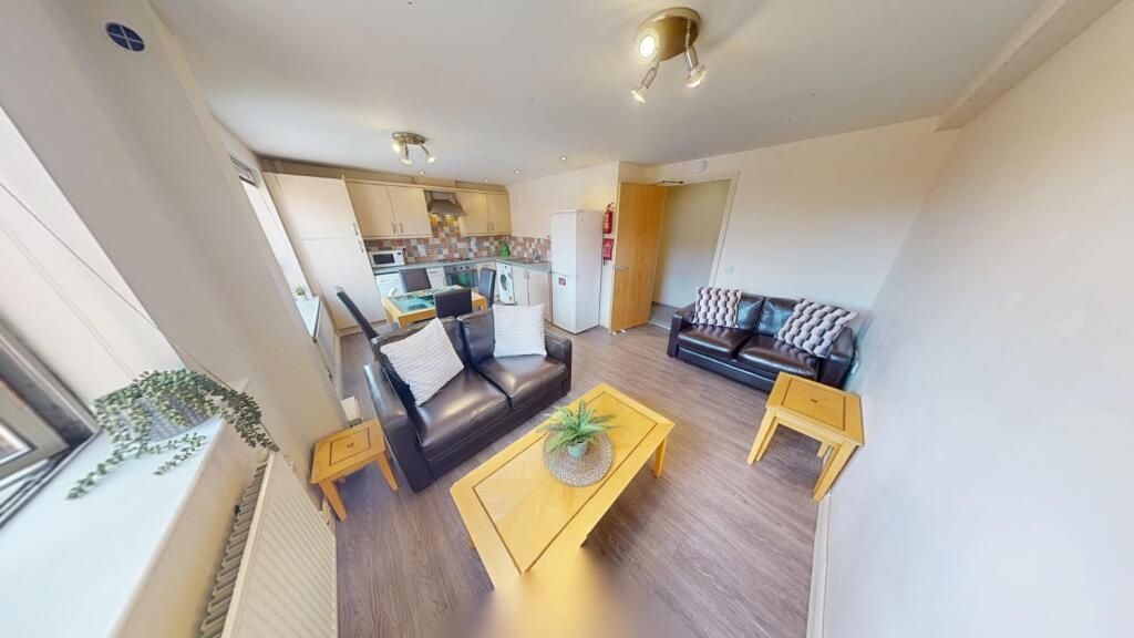 Property photo 3 of 8 Bright And Modern Living Room With Comfortable Sea...