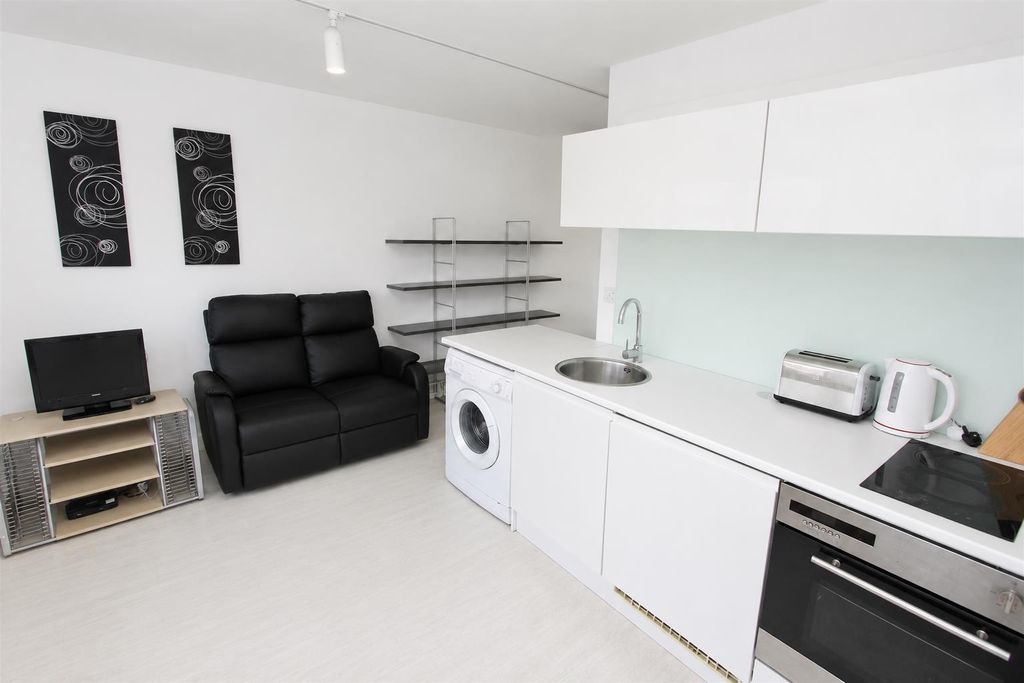 Property photo 1 of 6 Modern Studio With Sleek Kitchen And Sofa Area...