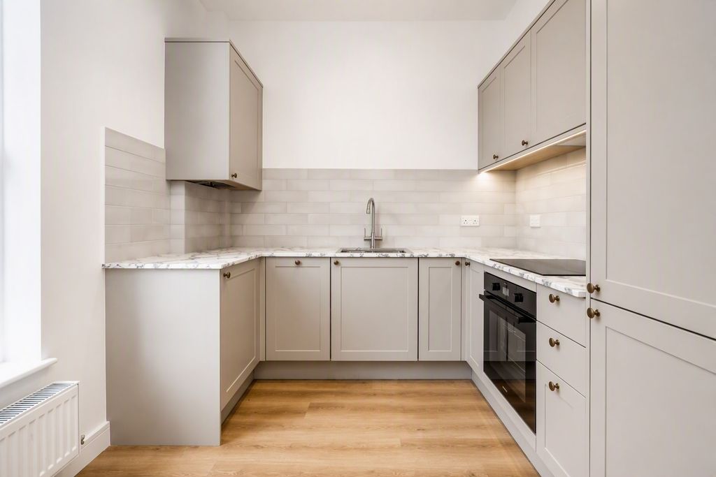 Property photo 3 of 7 Kitchen