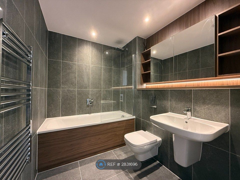 Property photo 3 of 6 Fully Tiled Bathroom With Rainhead Shower