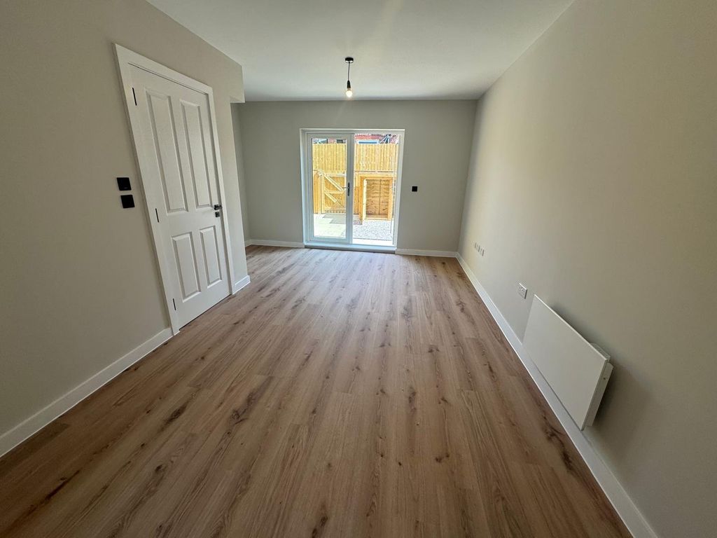 Property photo 2 of 11 Living Area