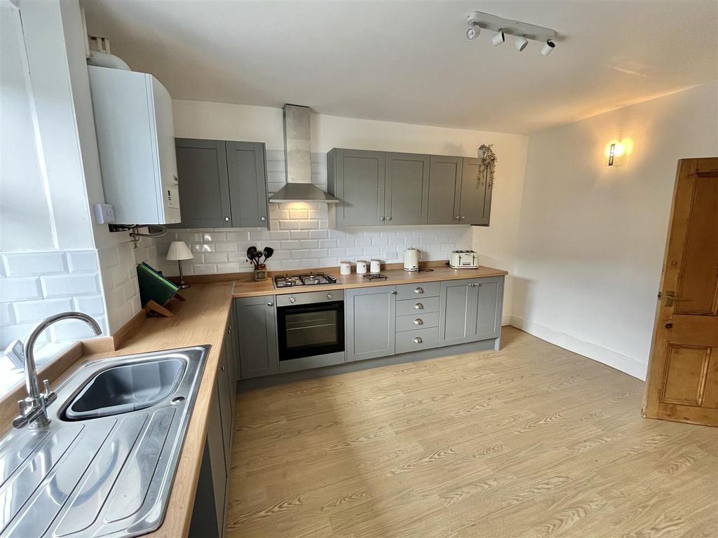 Property photo 3 of 14 Dining Kitchen