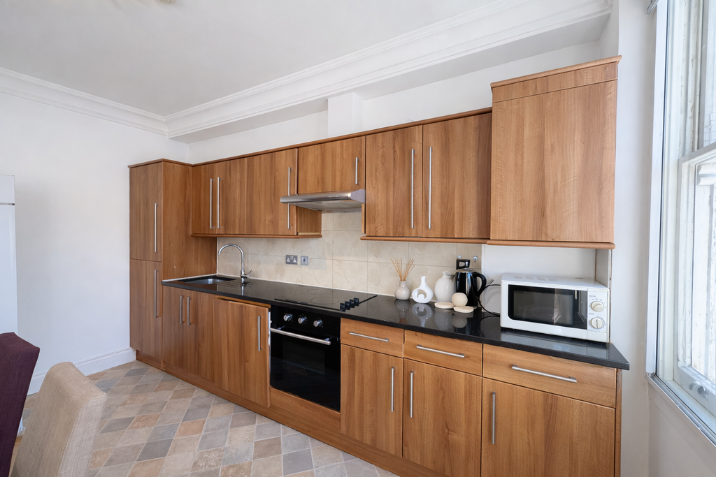 Property photo 3 of 10 Open Plan Kitchen