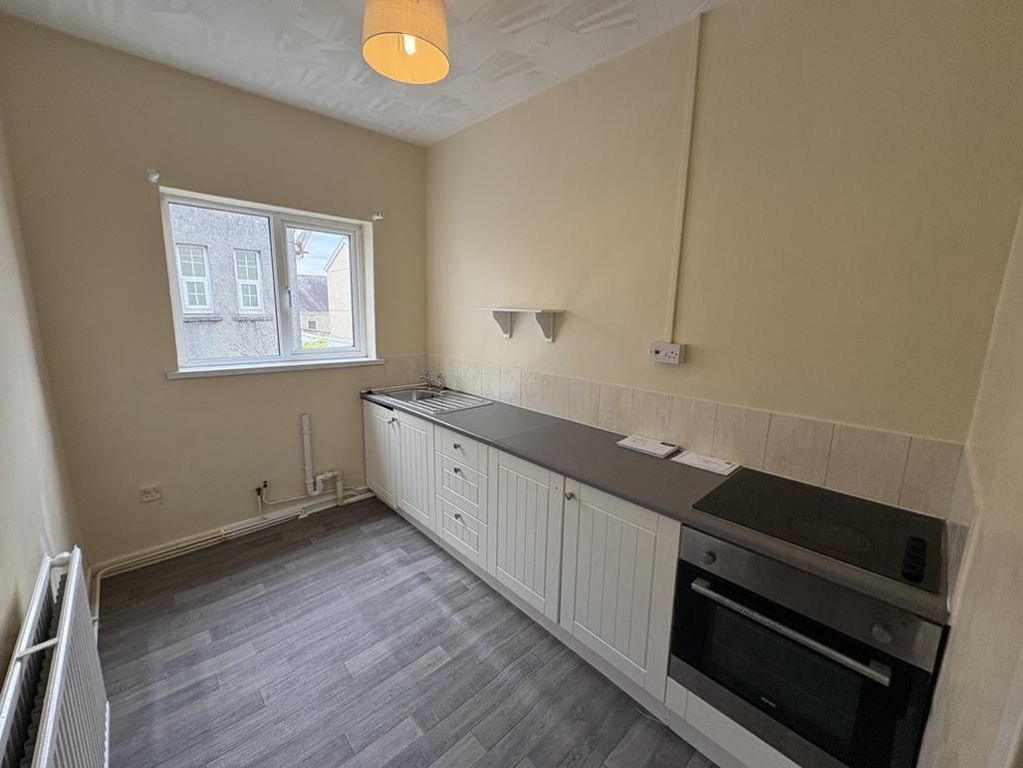 Property photo 3 of 7 Kitchen