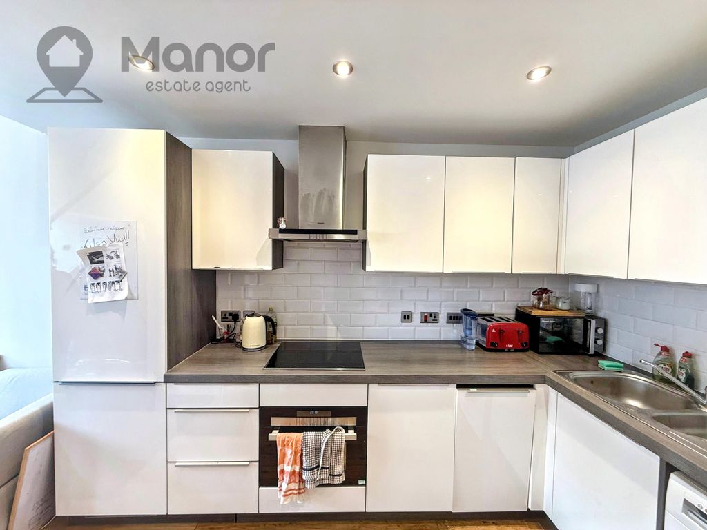 Property photo 1 of 8 Kitchen