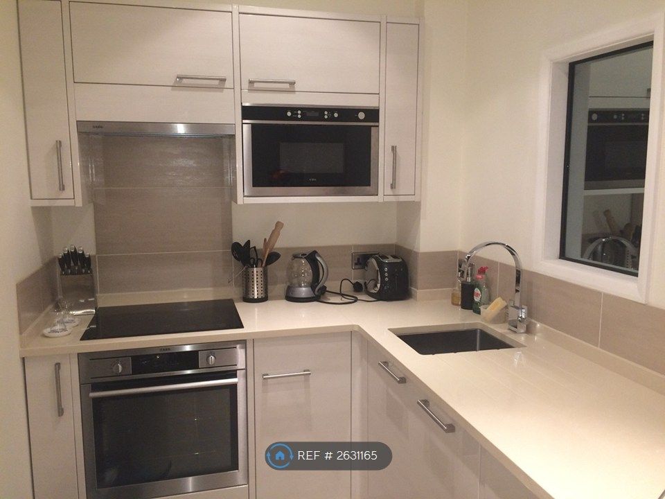 Property photo 3 of 8 Sleek, Modernised Kitchen With Induction Hob