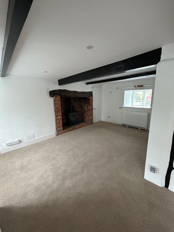 Property photo 3 of 15 Lounge With Wood Burner
