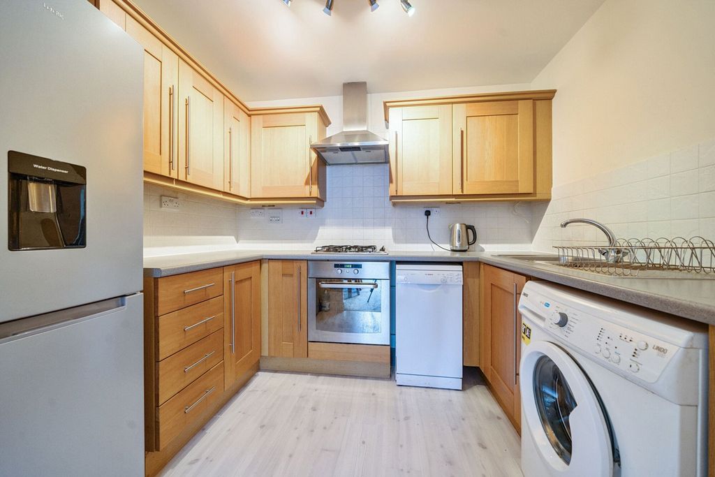 Property photo 2 of 11 Kitchen