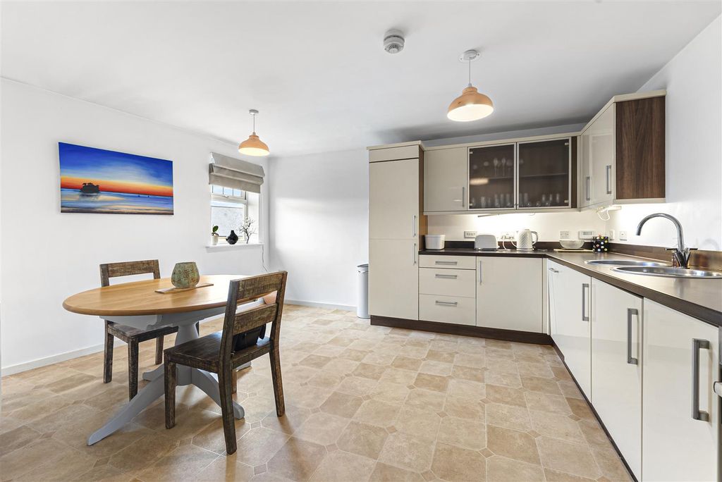 Property photo 3 of 16 Dining Kitchen