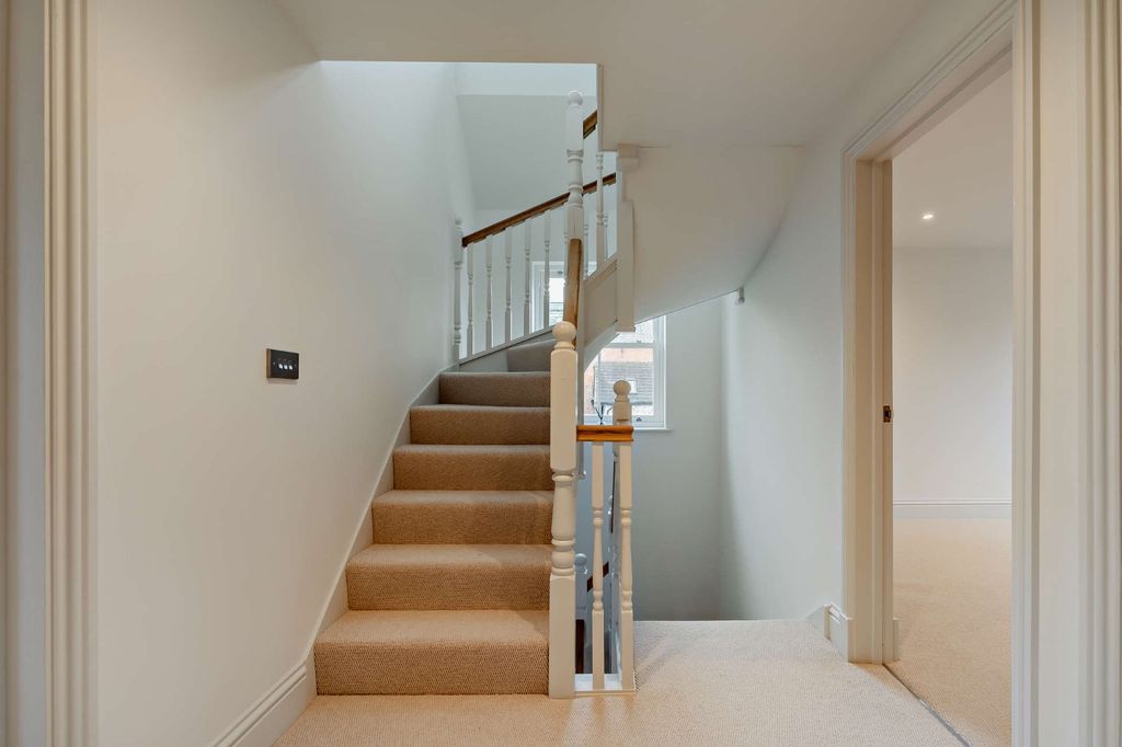 Property photo 2 of 11 Staircase