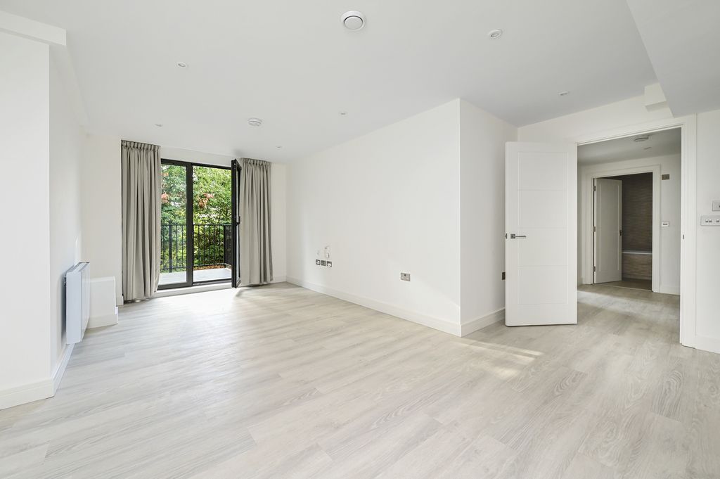 Property photo 1 of 9 Living Area