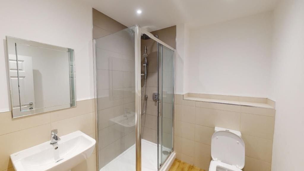 Property photo 3 of 3 A Modern And Clean Bathroom Featuring A Spacious S...