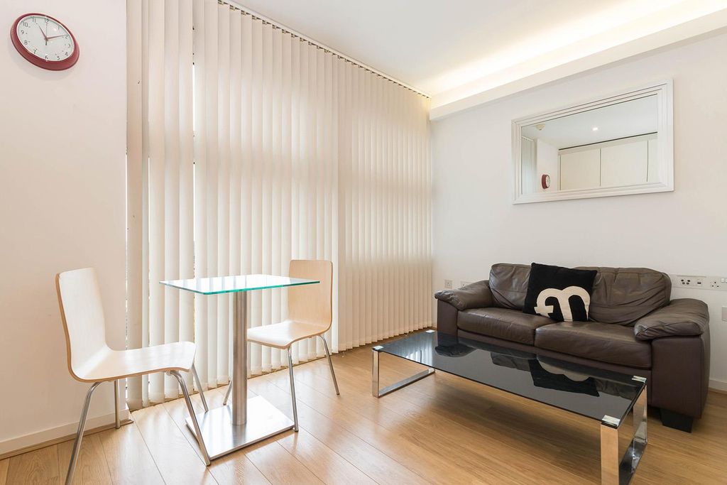 Property photo 2 of 12 Living Area