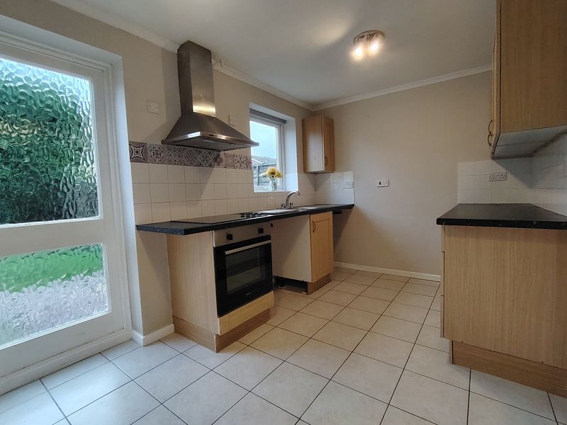 Property photo 3 of 8 Kitchen New