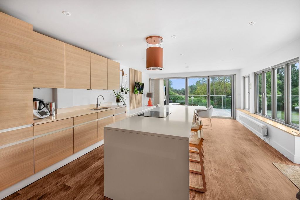 Property photo 3 of 30 Kitchen/Dining/Family Room