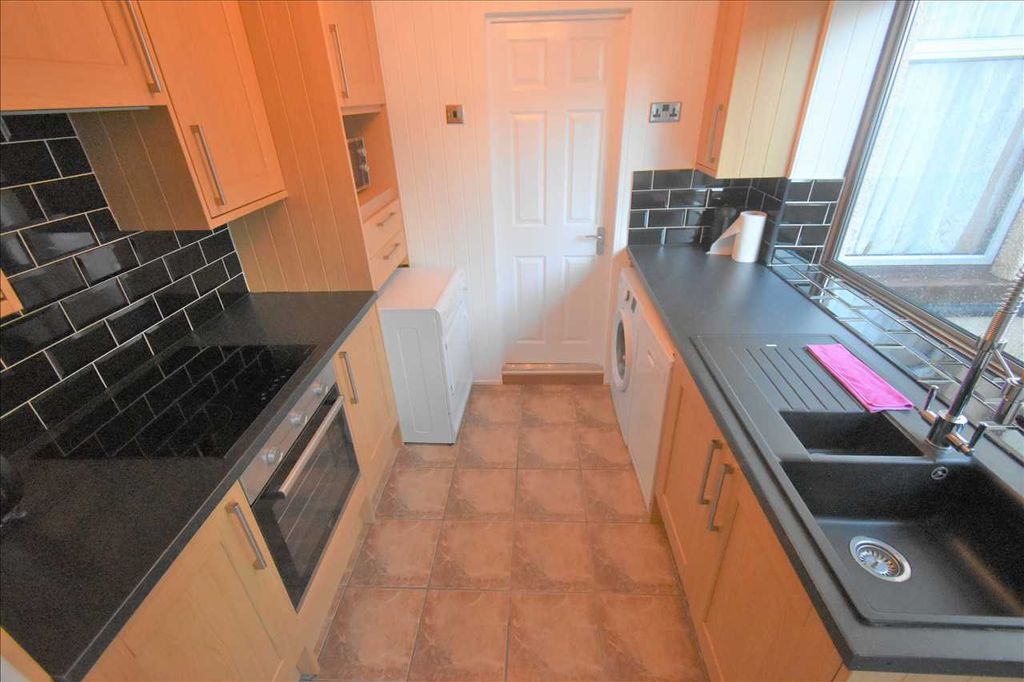 Property photo 3 of 4 Kitchen