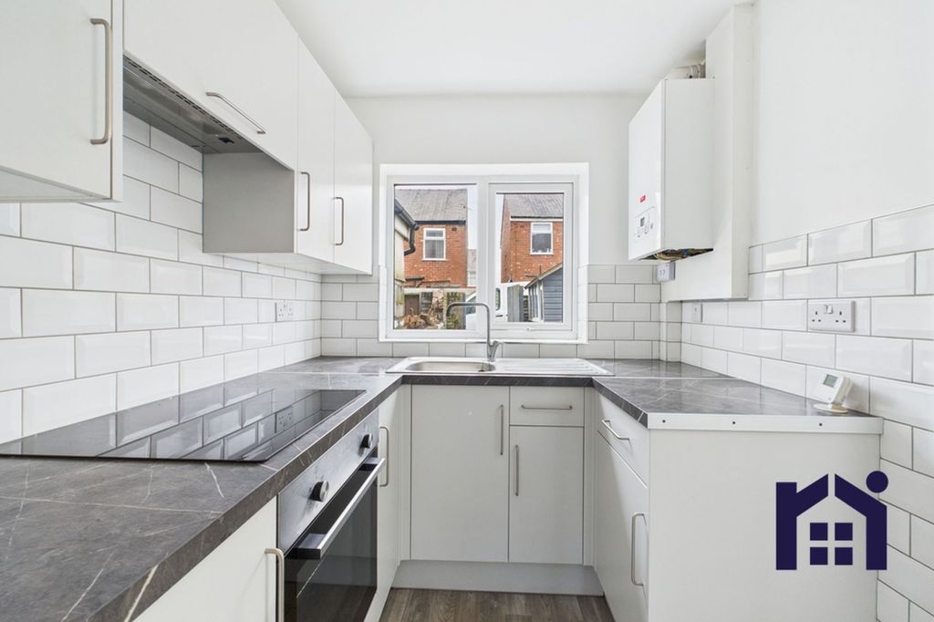 Property photo 3 of 16 Kitchen