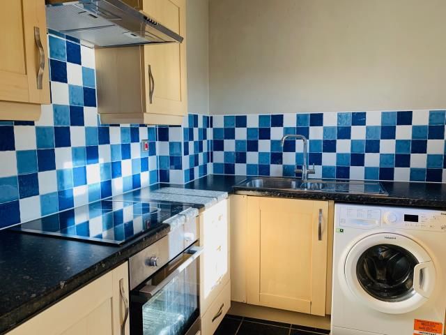 Property photo 3 of 9 Kitchen
