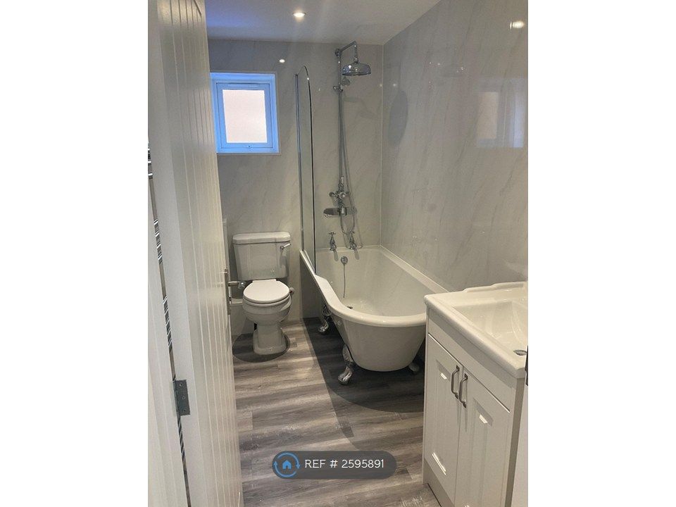 Property photo 3 of 9 Luxury Bathroom With Rainfall Shower.