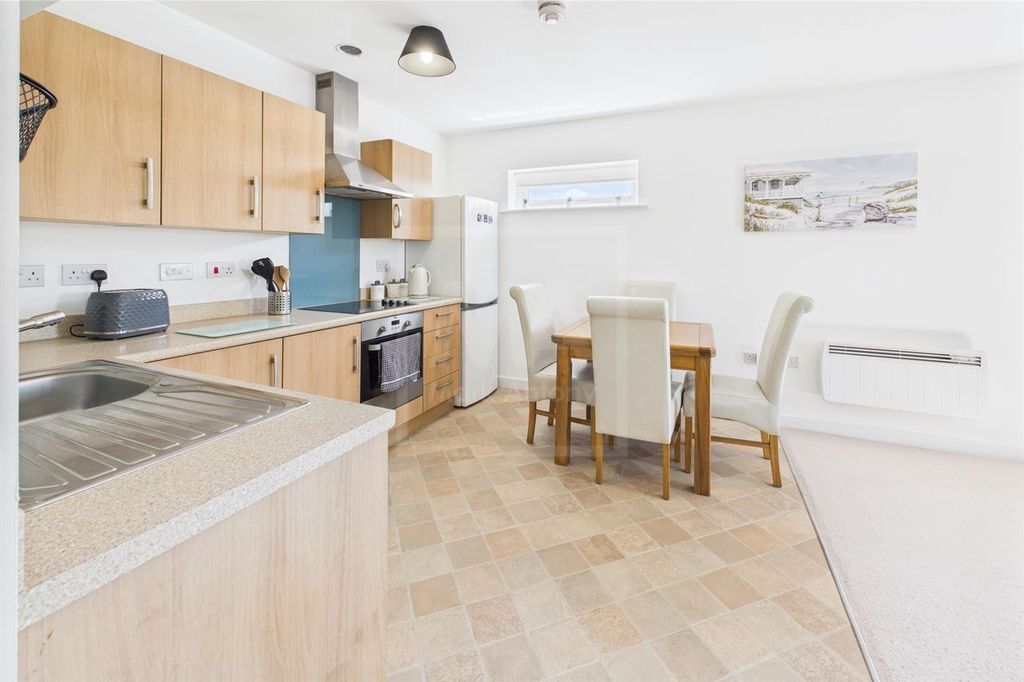 Property photo 3 of 16 Kitchen Area