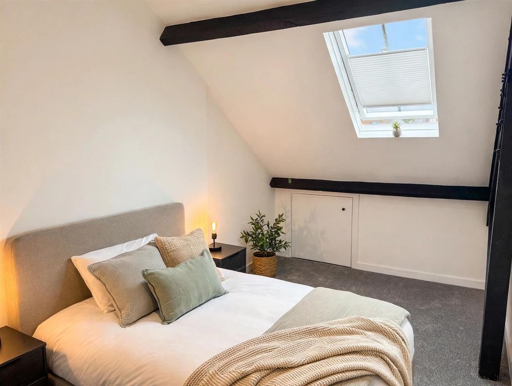 Property photo 3 of 14 07_Flat52_Bedroom_Velux_Blind_Open_Cushions_Plants