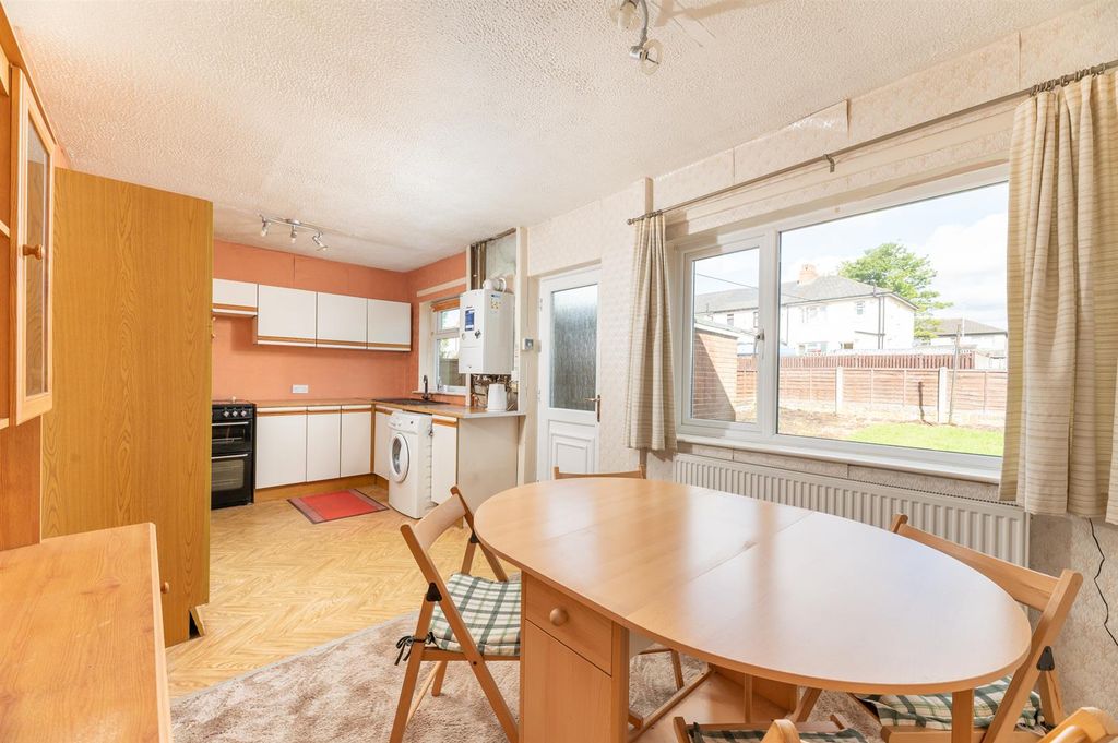 Property photo 2 of 18 Dining Kitchen