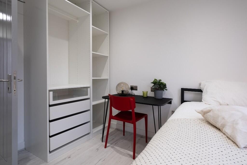 Property photo 3 of 13 Bright And Modern Master Bedroom Featuring A Large...