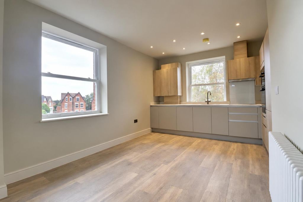 Property photo 2 of 24 Minimalist Kitchen With Hidden Appliances.Png