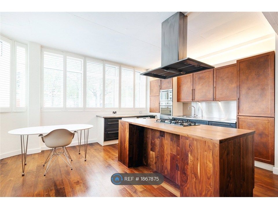 Property photo 2 of 12 Kitchen And Dining Area
