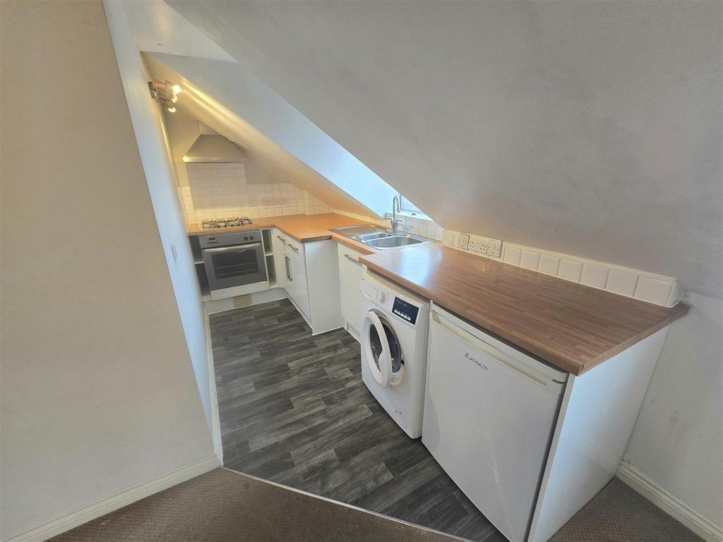 Property photo 3 of 8 Kitchen Area