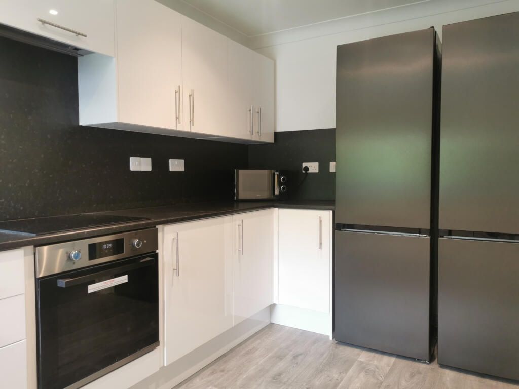 Property photo 3 of 12 Modern Kitchen With Dual Fridge-Freezers...