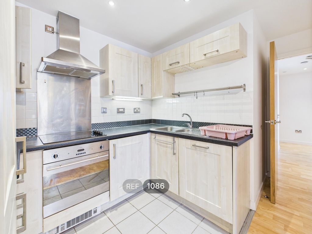 Property photo 1 of 18 Kitchen & Living Area