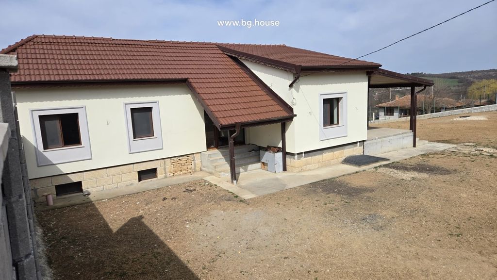 Property photo 2 of 100 Side Perspective Showing Windows, Entrance Steps, And Surrounding Yard Area