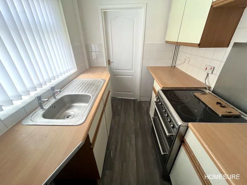 Property photo 3 of 8 Kitchen