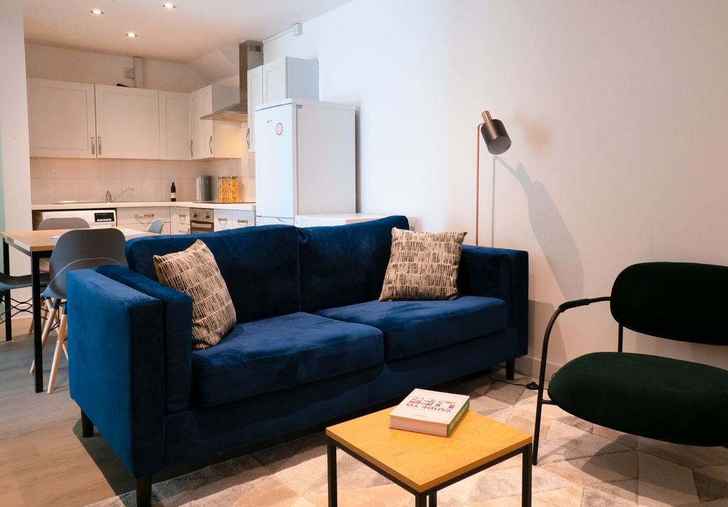 Property photo 2 of 5 A Bright And Inviting Living Room With Modern Furn...