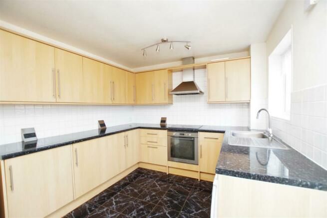 Property photo 3 of 8 Kitchen