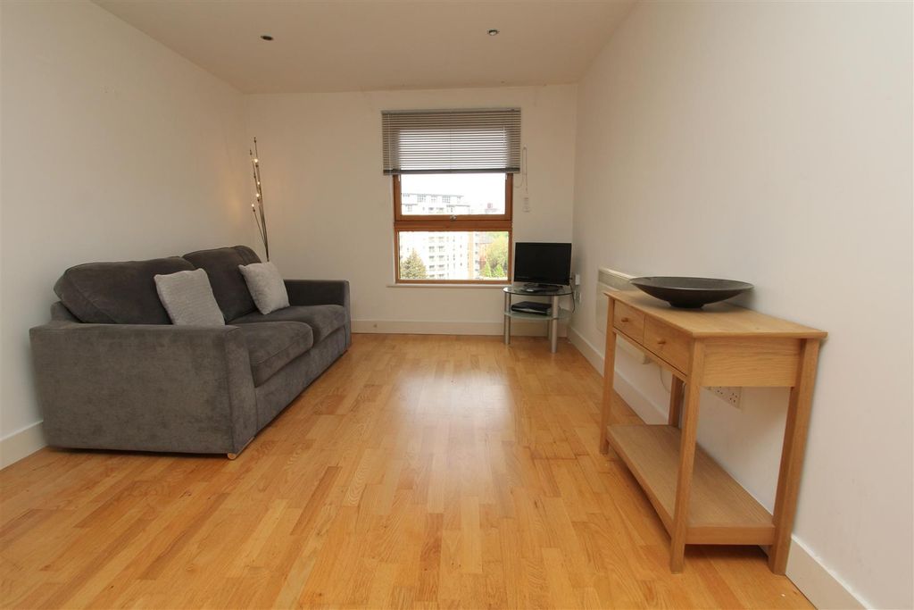 Property photo 3 of 10 Bright Lounge With Sleek Wood Flooring...