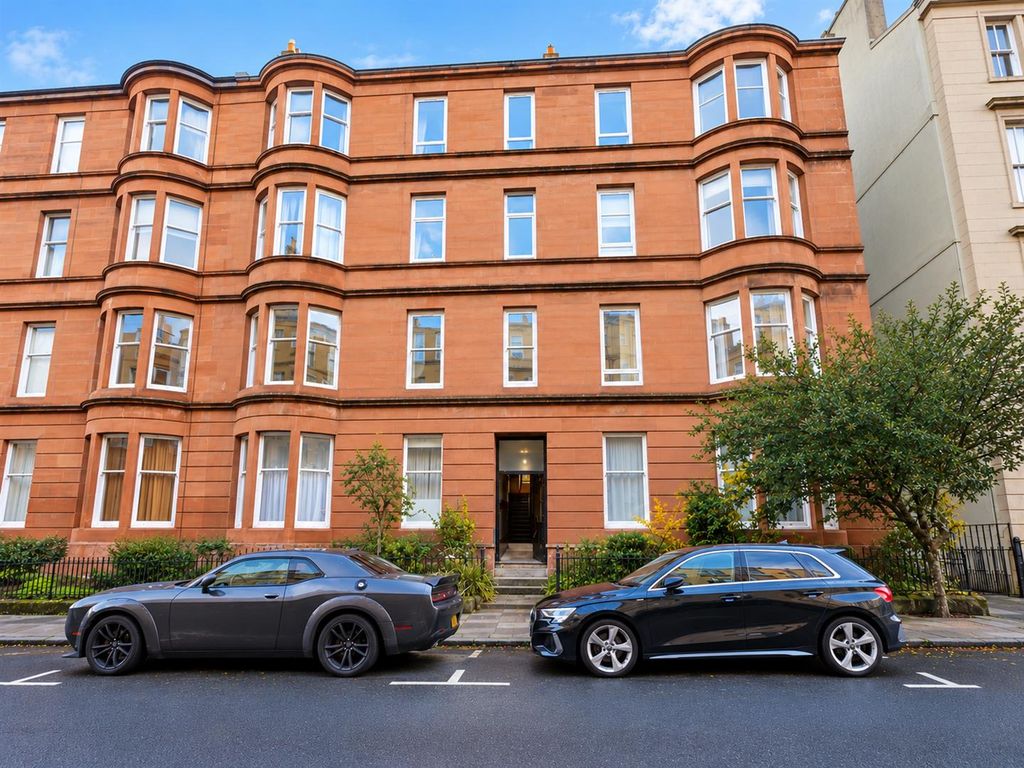 Property photo 1 of 12 Red Sandstone Tenement With Parked Cars.Png