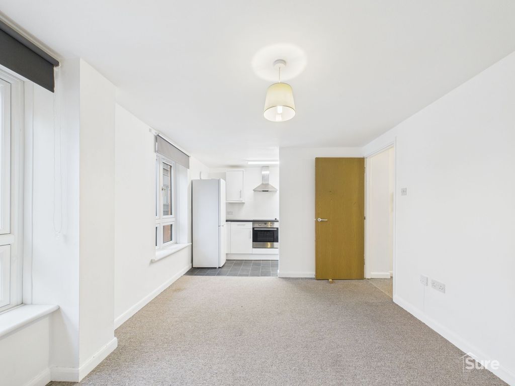 Property photo 2 of 8 Living Room And Kitchen Area