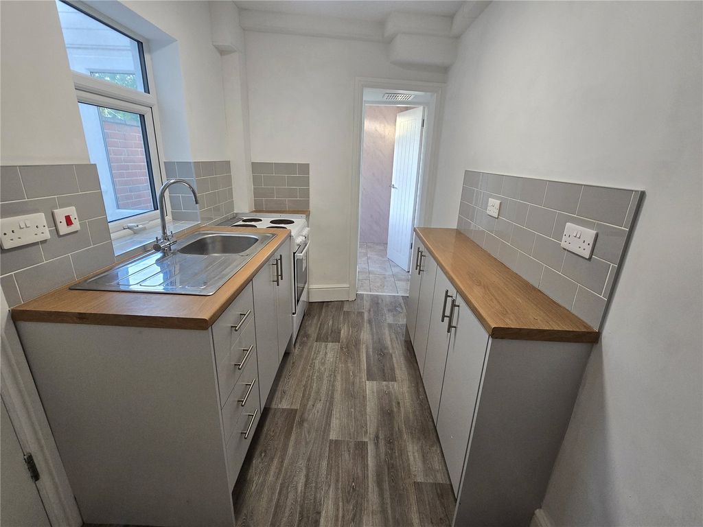 Property photo 3 of 13 Kitchen