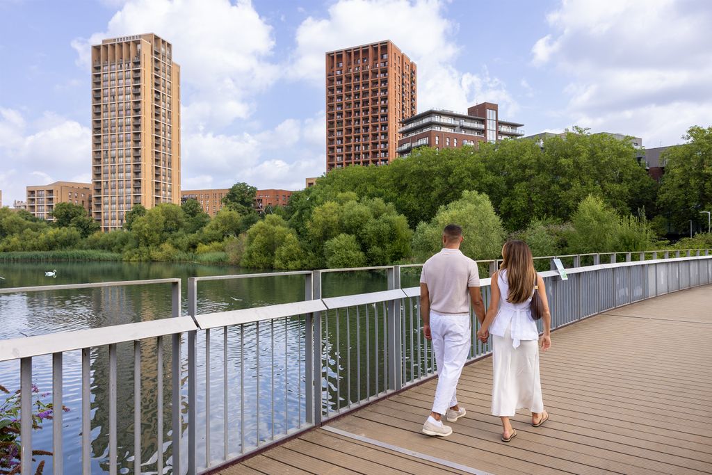 Property photo 1 of 6 Couple Walking Across The Bridge