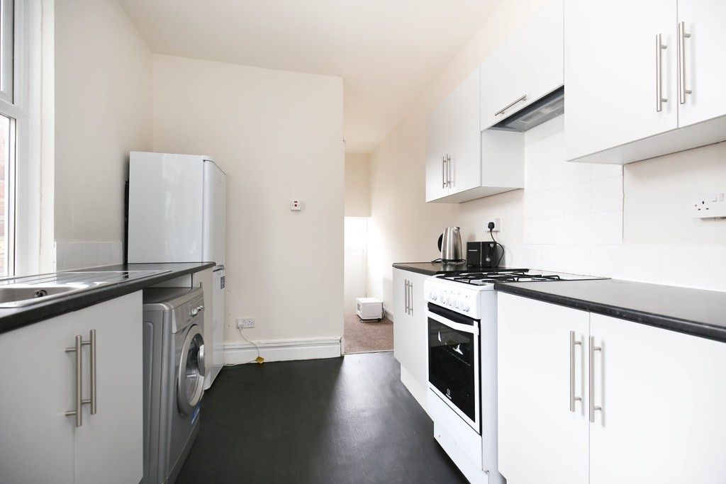 Property photo 3 of 4 Bright, Modern Galley Kitchen With White Cabinets,...