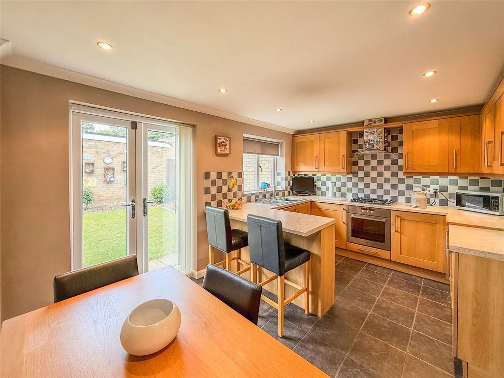 Property photo 3 of 12 Dining Kitchen