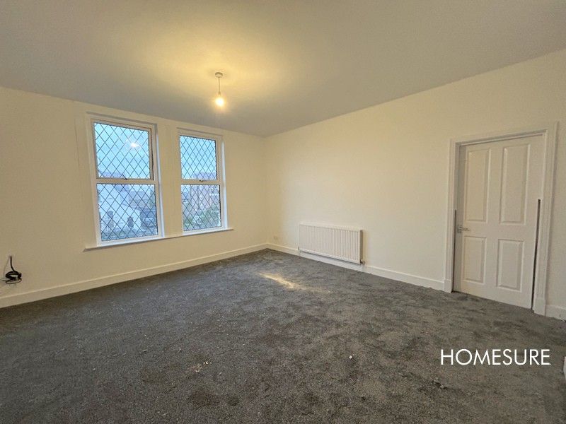 Property photo 2 of 8 Living Room