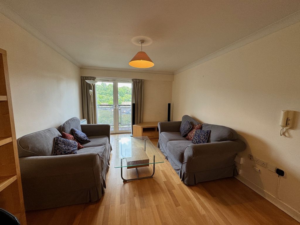 Property photo 1 of 9 Living Area