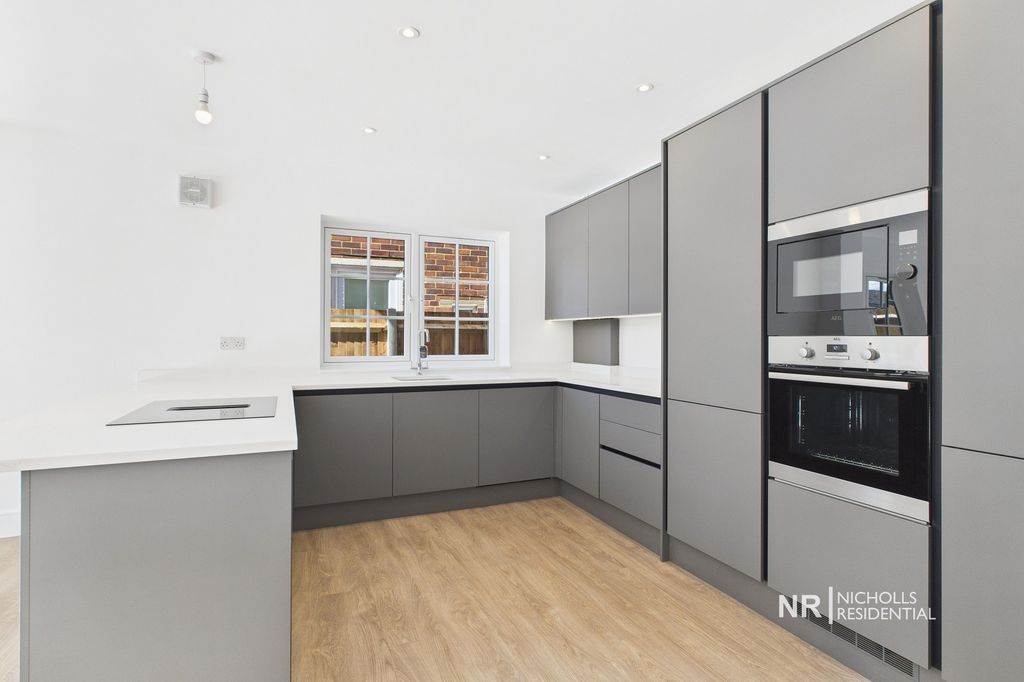 Property photo 2 of 17 Kitchen Area