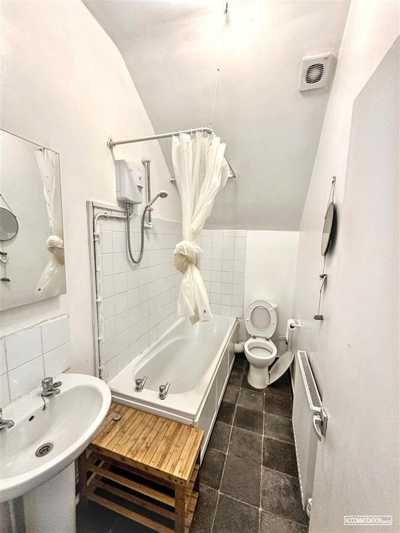 Property photo 3 of 5 Bright Bathroom Suite With Bathtub And Shower...