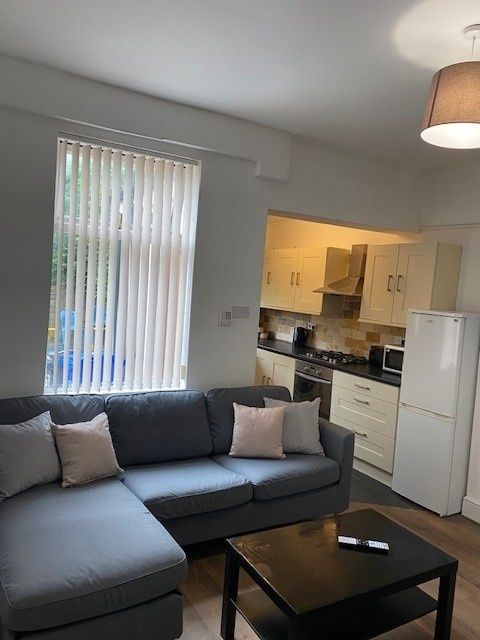 Property photo 2 of 15 This Inviting Living Room Features A Spacious Layo...