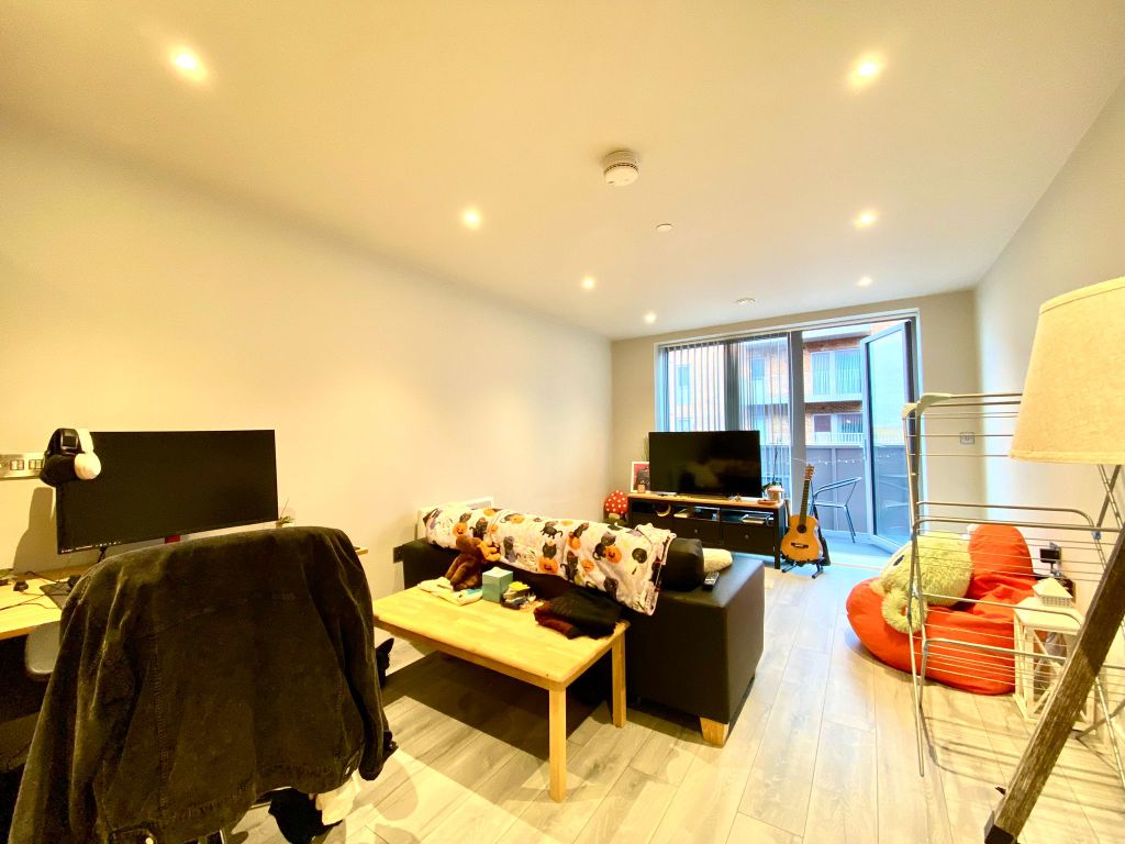 Property photo 3 of 11 Living Area