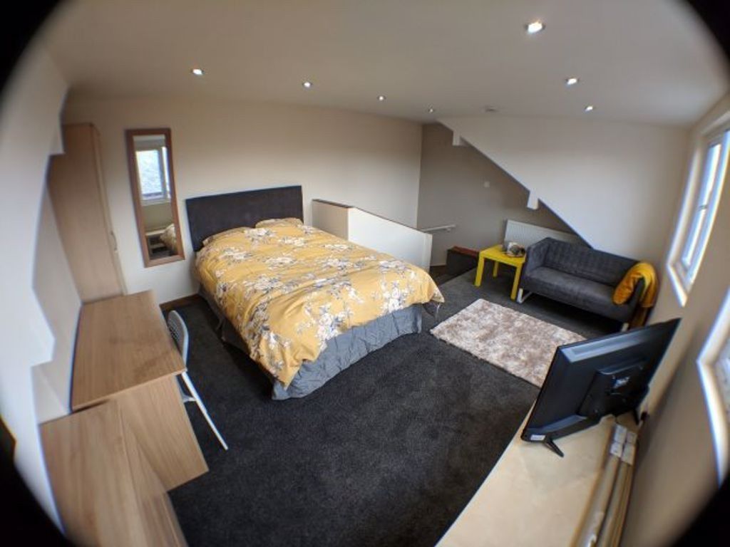 Property photo 3 of 22 A Spacious, Well-Lit Master Bedroom Featuring A Co...